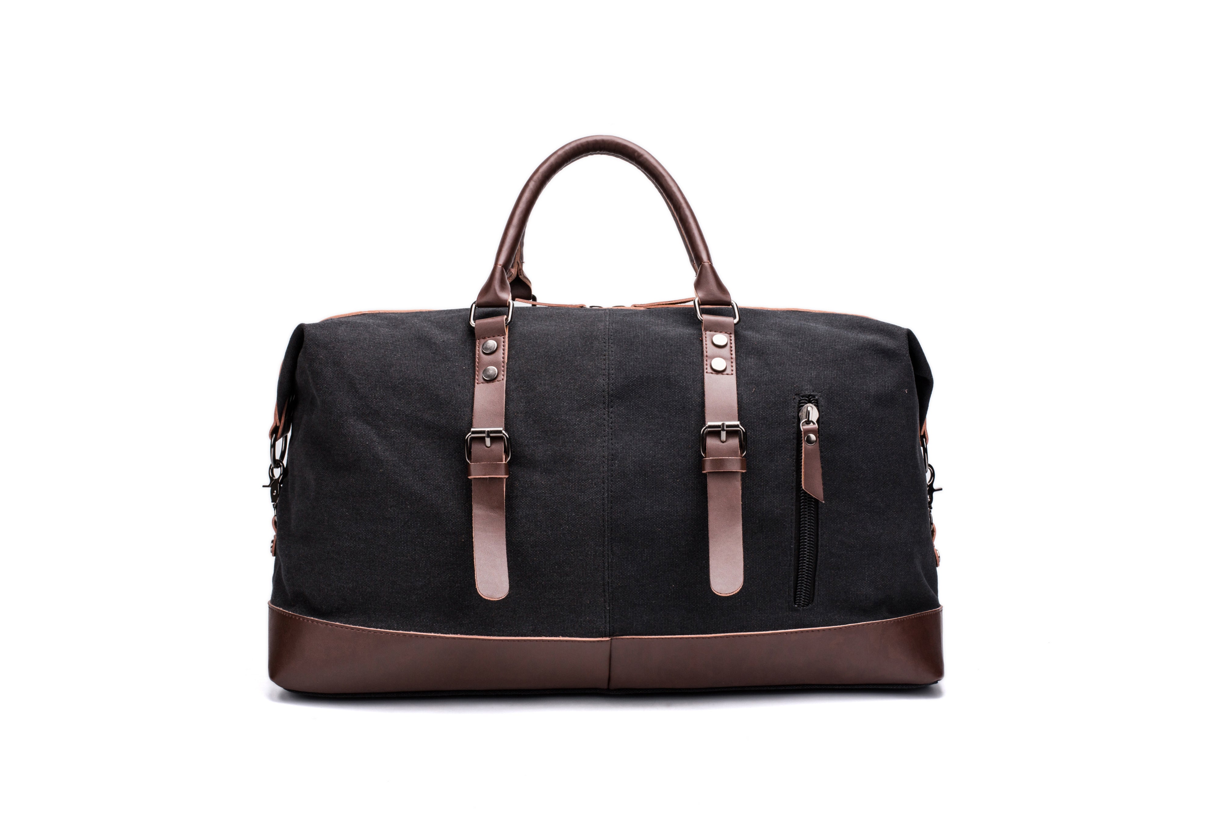 A black and brown Parvus 42L Duffel Bag, perfect as a weekend bag, travel bag, and carry-on luggage. This stylish and durable bag features seven pockets and genuine leather accents, making it ideal for short getaways, longer trips, and daily use.